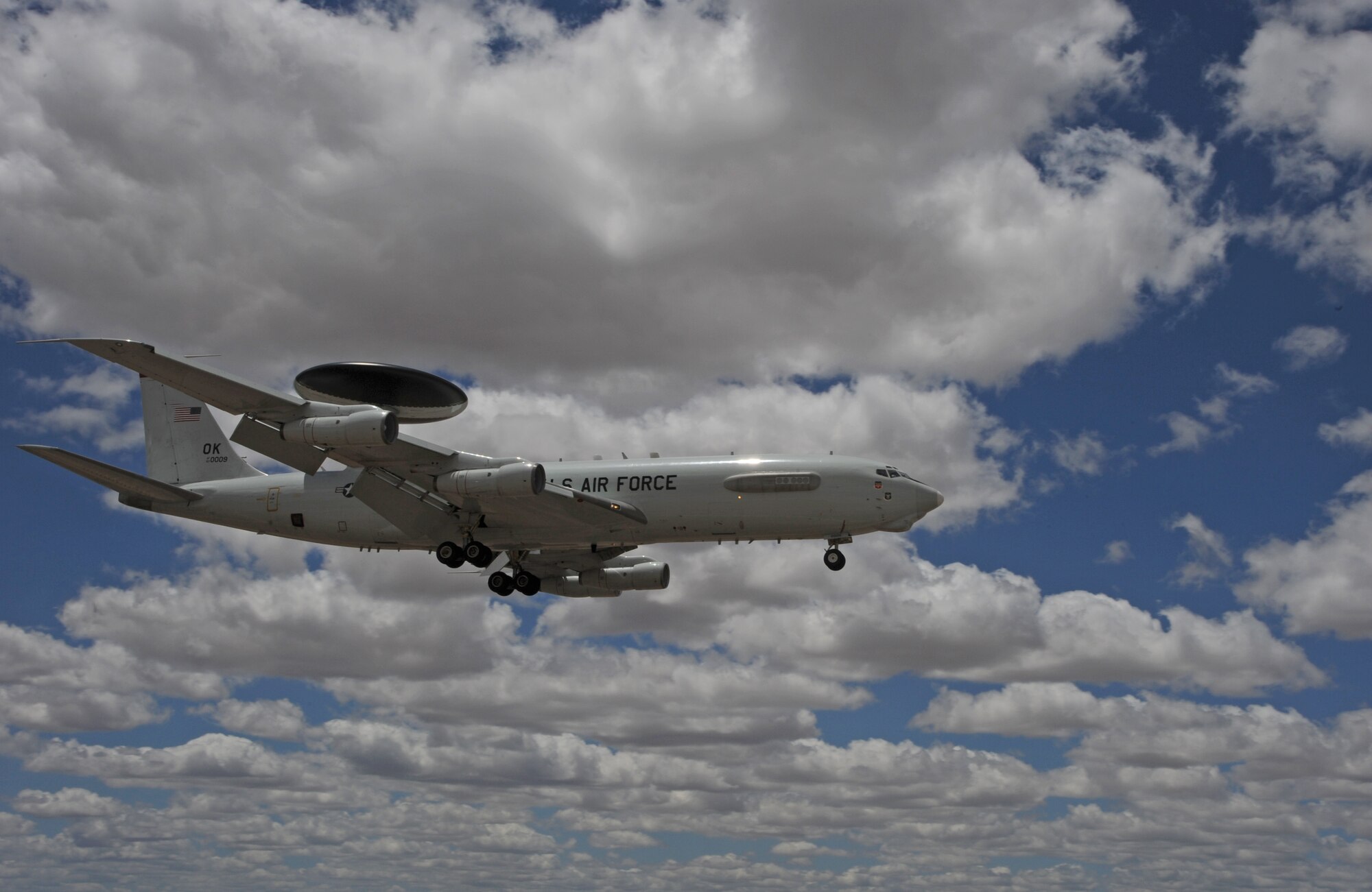 An E-3 Airborne Warning and Control System aircraft from Tinker Air Force Base, Okla., prepares to land at Davis-Monthan AFB, Ariz., May 16, 2015. Eight AWACS arrived here due to tornado alerts in Oklahoma.  AWACS provide all-weather surveillance, command, control and communications needed by commanders of U.S. and NATO air defense forces. (U.S. Air Force photo by Senior Airman Betty R. Chevalier)