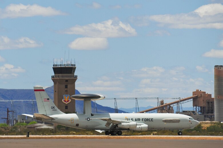 An E-3 Airborne Warning and Control System aircraft from Tinker Air Force Base, Okla., lands on the flightline at Davis-Monthan AFB, Ariz., May 16, 2015. Eight AWACS arrived here due to tornado alerts in Oklahoma. (U.S. Air Force photo by Airman 1st Class Chris Massey/Released)