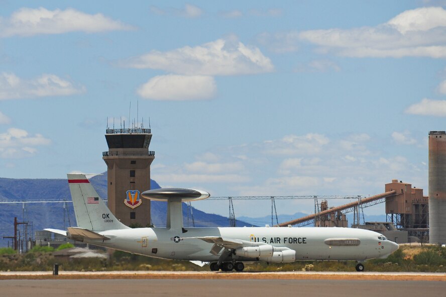 An E-3 Airborne Warning and Control System aircraft from Tinker Air Force Base, Okla., lands on the flightline at Davis-Monthan AFB, Ariz., May 16, 2015. Eight AWACS arrived here due to tornado alerts in Oklahoma. (U.S. Air Force photo by Airman 1st Class Chris Massey/Released)