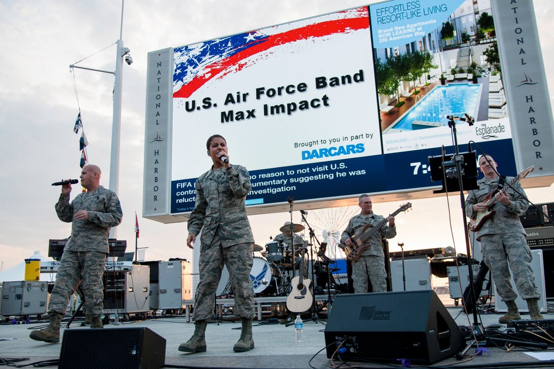 U.S. Air Force premier rock band Max Impact plays at the National Harbor in Fort Washington, Md., as part of the Military Concert Series May 15, 2015. Performances are slated to include bands from multiple branches of military service during select weekends from May-September. (U.S. Air Force photo/Airman 1st Class Philip Bryant)