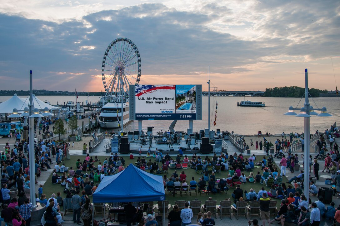 The U.S. Air Force’s premier rock band, Max Impact, plays at the National Harbor in Fort Washington, Md., as part of the Military Concert Series May 15, 2015. Performances will include bands from multiple branches of military service during select weekends from May-September. (U.S. Air Force photo/Airman 1st Class Philip Bryant)