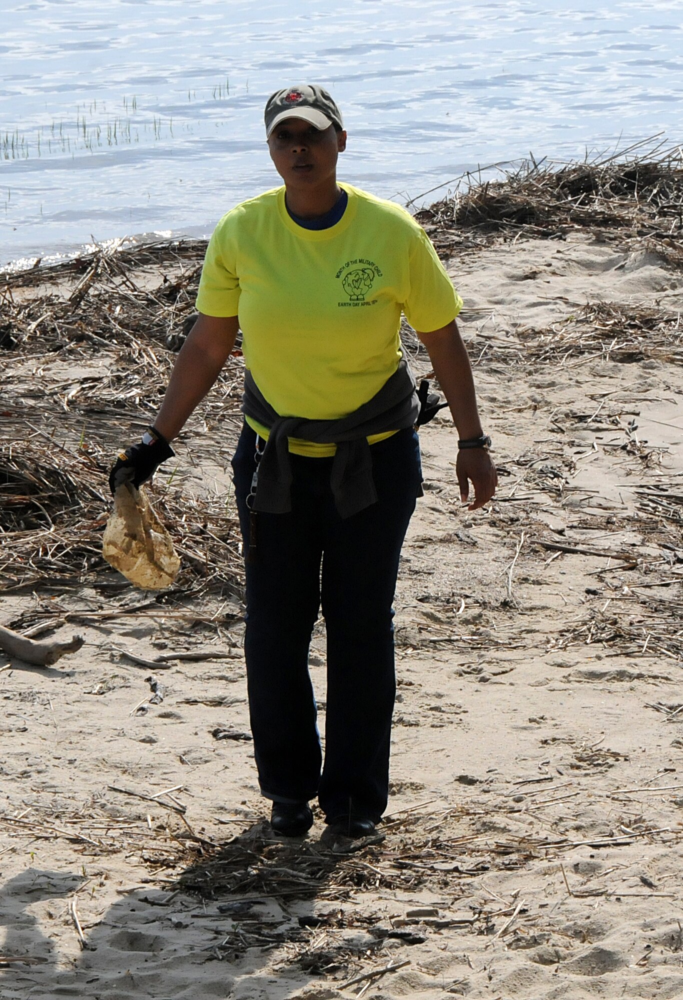 Virginia military members from the 192nd Fighter Wing, 203rd Red Horse Squadron, and the Virginia Army National Guard, and their families volunteered April 18, 2015, to help clean and improve York River State Park in Williamsburg. The families served in honor of the Month of the Military Child as they cleared waste and spread fresh mulch on the playground and around selected trees. (U.S. Air National Guard photo by Airman 1st Class Johnisa B. Roberts/Released)
