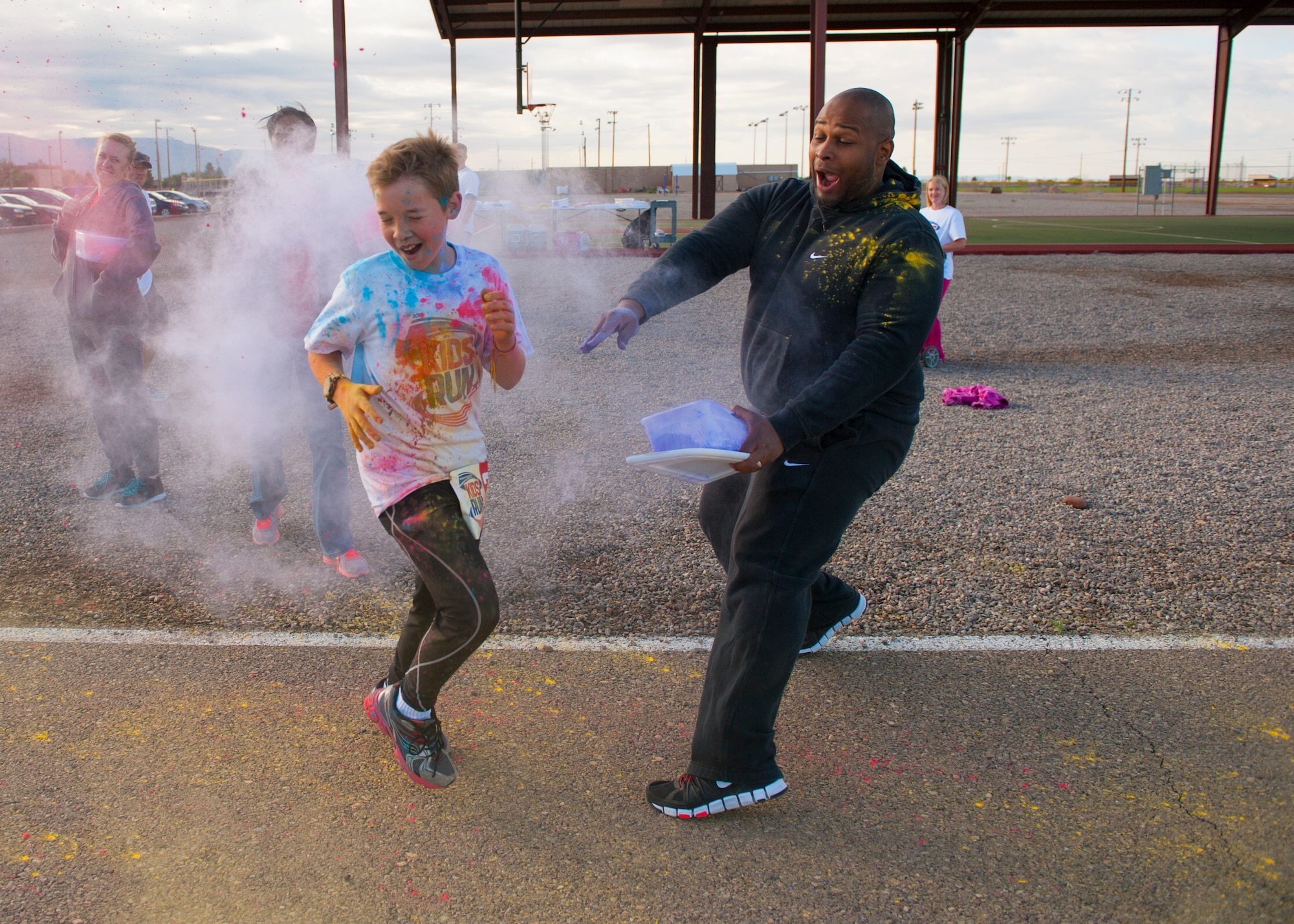 A member of Team Holloman’s dependent participates in America’s Armed Forces Kids Fun Run at Holloman Air Force Base, N.M. May 16, 2015. This event was created for children ages 5 to 13. The younger kids would run 0.5 mile, with the 7 and 8 year olds running 1 mile, and the older kids running 2 miles. (U.S. Air Force photo by Senior Airman Leah Ferrante/Released)