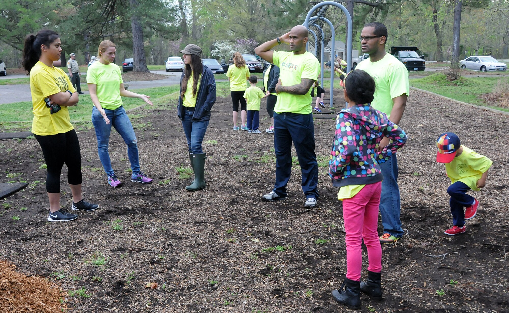 Virginia military members from the 192nd Fighter Wing, 203rd Red Horse Squadron, and the Virginia Army National Guard, and their families volunteered April 18, 2015, to help clean and improve York River State Park in Williamsburg. The families served in honor of the Month of the Military Child as they cleared waste and spread fresh mulch on the playground and around selected trees. (U.S. Air National Guard photo by Airman 1st Class Johnisa B. Roberts/Released)
