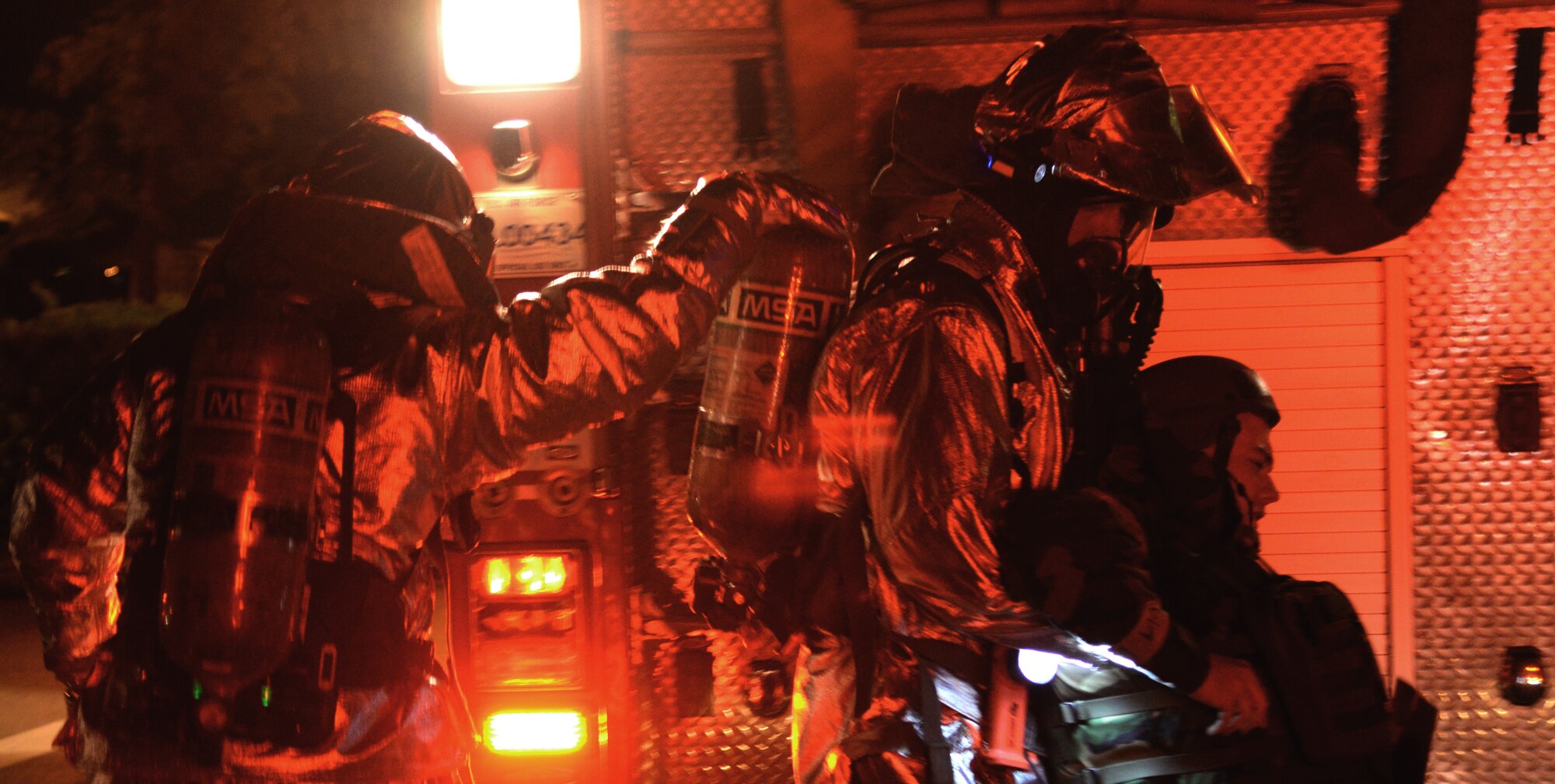 First responders from the 51st Civil Engineer Suqadron remove an exercise casualty during a simulated mass casualty exercise May 12, 2015, at Osan Air Base, Republic of Korea. The simulation was part of Beverly Midnight 15-02, a readiness exercise designed to test the capabilities of Team Osan. (U.S. Air Force photo by Staff Sgt. Benjamin Sutton/Released)  