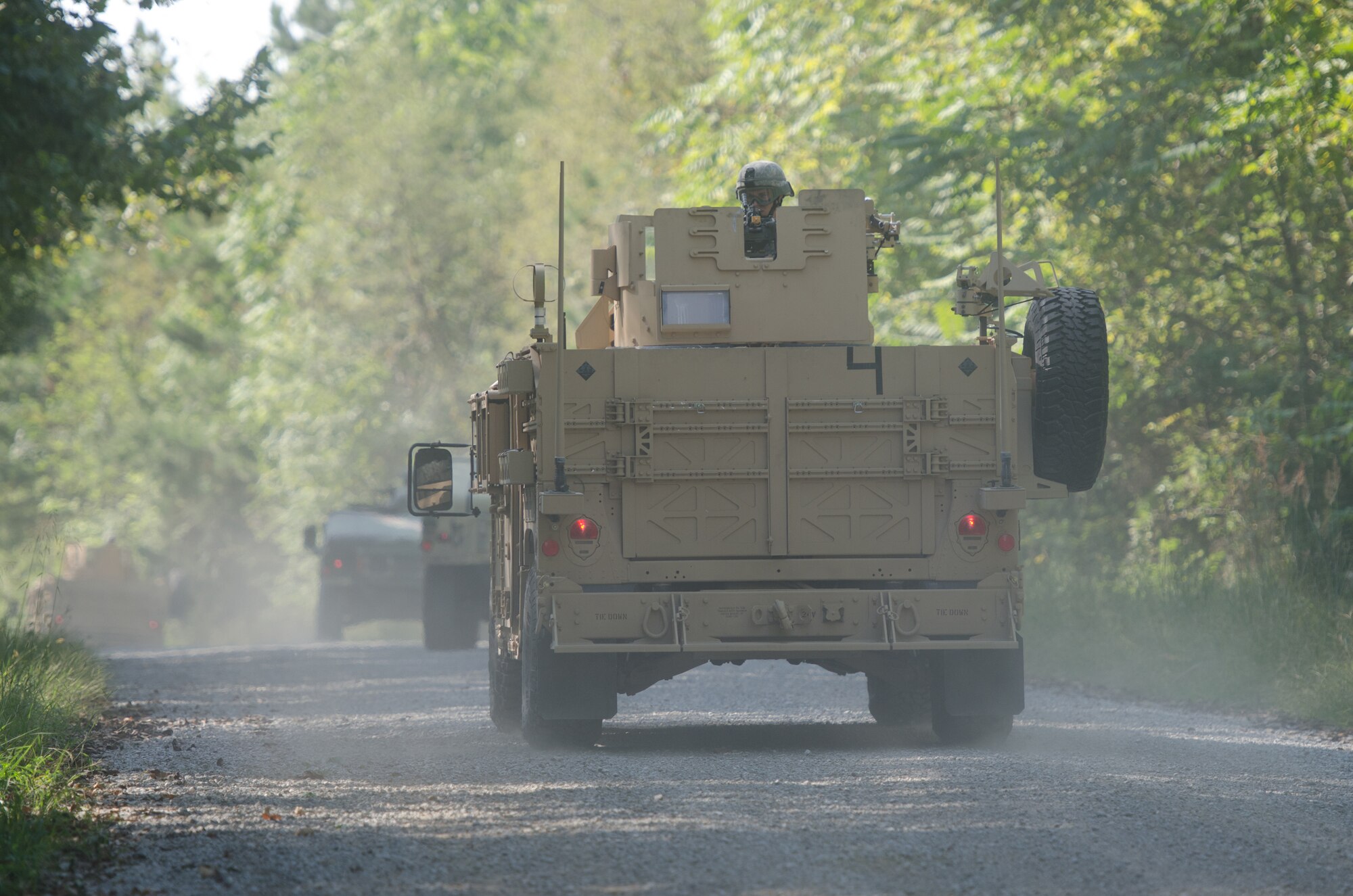 Personnel from the Kentucky Air National Guard’s 123 Security Forces Squadron execute a mounted patrol during a training exercise at the Wendell H. Ford Regional Training Center in Greenville, Ky., on Sept. 17, 2014. The unit’s Airmen conducted a five-day, combat-skills training course to prepare for future deployments. (U.S. Air National Guard photo by Master Sgt. Phil Speck)
