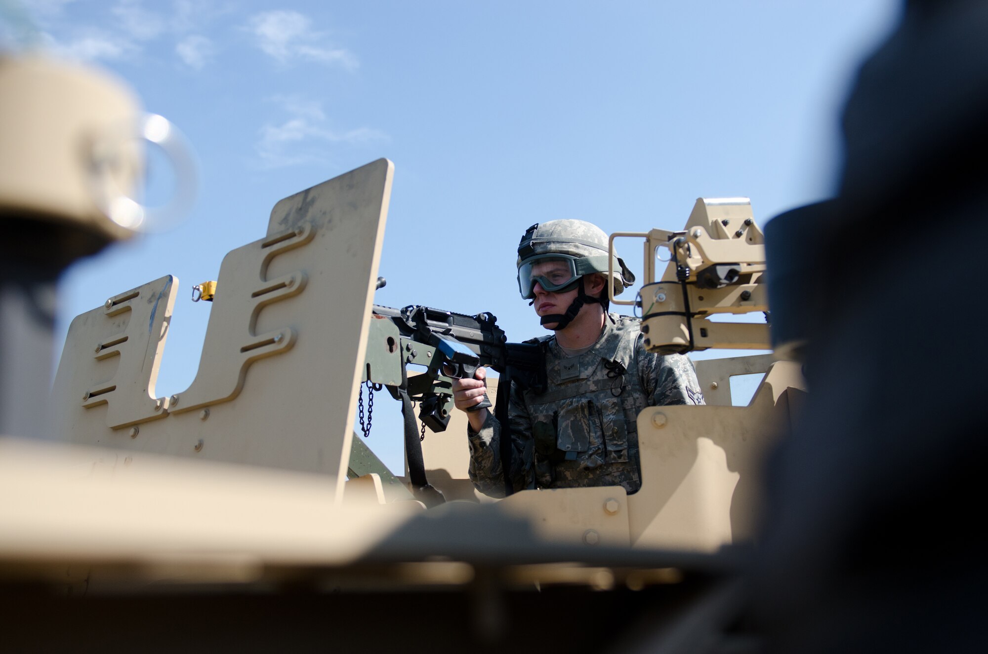 Airman First Class Adam Cantrell, a security forces journeyman from the Kentucky Air National Guard’s 123rd Security Forces Squadron, provides over watch during a mounted patrol as part of a training exercise at the Wendell H. Ford Regional Training Center in Greenville, Ky., on Sept. 17, 2014. The unit’s Airmen conducted a five-day, combat-skills training course to prepare for future deployments. (U.S. Air National Guard photo by Master Sgt. Phil Speck)
