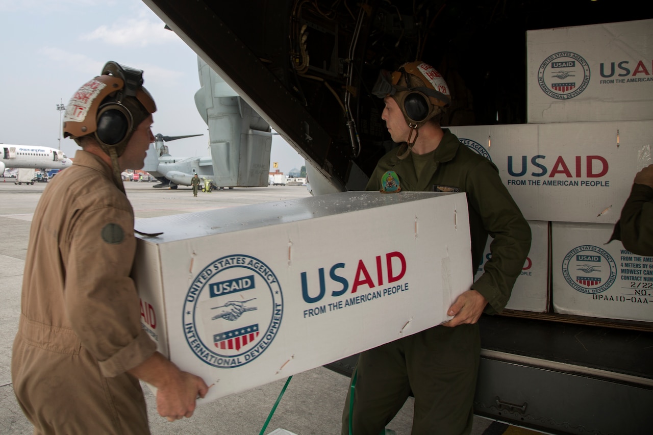 U.S. Marines from Joint Task Force 505 load relief supplies from the United States Agency for International Development onto a U.S. Marine Corps MV-22 Osprey at Tribhuvan International Airport, Kathmandu, Nepal, May 17. U.S. Marine Corps photo by Lance Cpl. Hernan Vidana