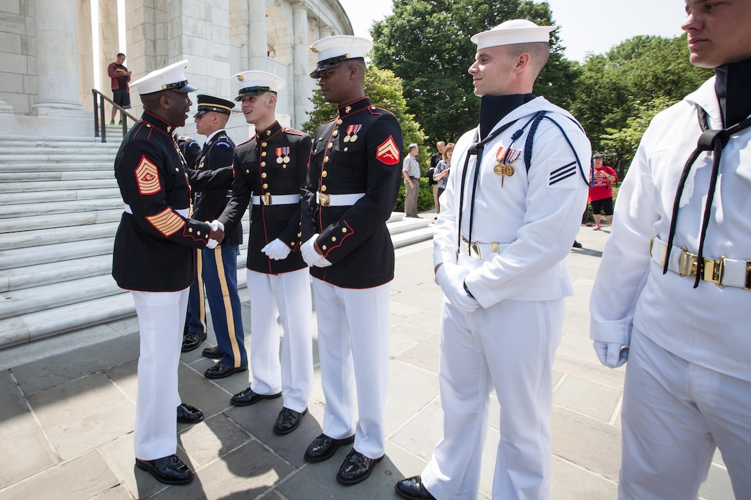 Sgt. Maj. Ronald L. Green, the 18th Sergeant Major of the Marine Corps, participates in a wreath laying ceremony at the Tomb of the Unknown Soldier in honor of National Armed Forces Day at Arlington National Cemetery in Arlington, VA., May 16, 2015. (U.S. Marine Corps photo by Sgt. Melissa Marnell)