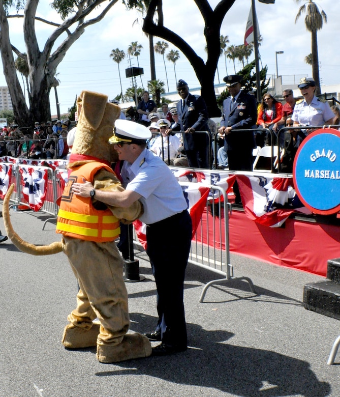 Bobber embraces Coast Guard Rear Admiral Joseph A. Servidio, Eleventh Coast Guard District, commander at the end of the 56th Annual Torrance Armed Forces Day parade May 17. 