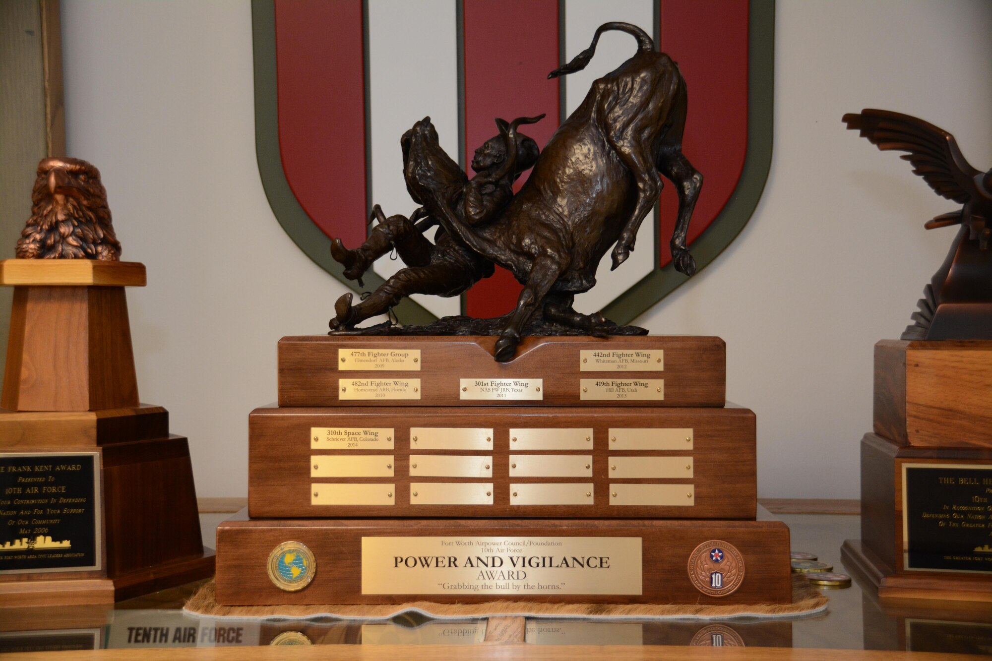 The 310th Space Wing, Schriever Air Force Base, Colo., won the 10th Air Force Power and Vigilance award here May 12, 2015. The award is presented once a year to the unit that goes above and beyond to accomplish the mission as "the premier provider of affordable, integrated, flexible, and mission-ready Citizen Airmen to execute power and vigilance missions in support of U.S. National Security.” The 310th SW is the sixth unit to be honored since the award’s establishment in 2009.