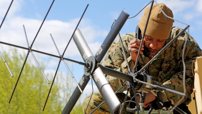 Sgt. Kentrell Billups, a radio technician with 1st Air Naval Gunfire Liaison Company, tries to establish satellite communications with the division fire support cell during Exercise Maple Resolve 2015 aboard Canadian Manoeuvre Training Center, Camp Wainwright, Alberta, May 9, 2015. The multi-national exercise, conducted annually by the Canadian Army, is a three-week high-readiness validation exercise for Canadian Army elements designated for domestic or international operations. This year, the 1st Canadian Army Division and the 5th Canadian Mechanized Battle Group are being supported by the British 12th Armoured Infantry Brigade, various U.S. Army elements, and for the first time, members of  I MEF’s 1st ANGLICO who bring a unique capability to the table.