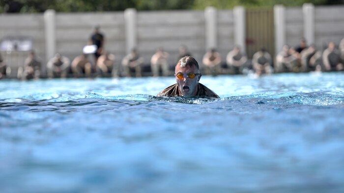 A reconnaissance Marine swims 500 meters during a qualification to compete in the Recon Challenge at Marine Corps Base Camp Pendleton, California, May 14, 2015. The Recon Challenge is an annual competition of grueling tests, hosted by the Reconnaissance Training Company, Advanced Infantry Training Battalion, School of Infantry West, and conducted by volunteers from the recon community in honor of reconnaissance Marines and sailors killed in action.