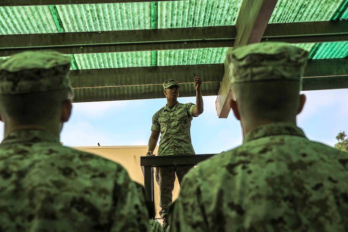 Corporal Cesar Alvarado, armorer, Headquarters Company, Headquarters and Service Battalion, instructs recruits of India Company, 3rd Recruit Training Battalion, to inspect each piece of their rifle cleaning gear to confirm their isn’t anything broken or missing during rifle issue at Marine Corps Recruit Depot San Diego, Calif., May 11. Today, all males recruited west of the Mississippi are trained at MCRD San Diego. The depot is responsible for training more than 16,000 recruits annually. India Company is scheduled to graduate from recruit training on July 31.