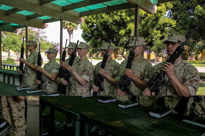 Recruits of India Company, 3rd Recruit Training Battalion, stand with their issued M16-A4 Service Rifles during rifle issue at Marine Corps Recruit Depot San Diego, Calif., May 11. Recruits and their rifles will become inseparable and function as one throughout the remainder of recruit training. Today, all males recruited west of the Mississippi are trained at MCRD San Diego. The depot is responsible for training more than 16,000 recruits annually. India Company is scheduled to graduate from recruit training on July 31.