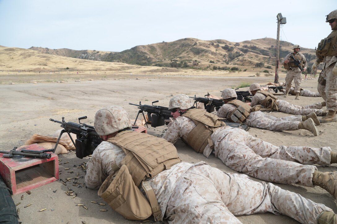 U.S. Marines and Sailors with the 13th Marine Expeditionary Unit Command Element (13th MEU CE) conduct M240 and M249 familiarization training during Command Post Exercise 1 (CPX-1) aboard Camp Pendleton, Calif. May 13, 2015. From 11-14 May, 13th MEU CE conducted CPX-1 in order to improve unit effectiveness in the areas  of command and control, and basic field skills.  (U.S. Marine Corps photo by Cpl. David Gonzalez, 13th Marine Expeditionary Combat Camera/ Released)