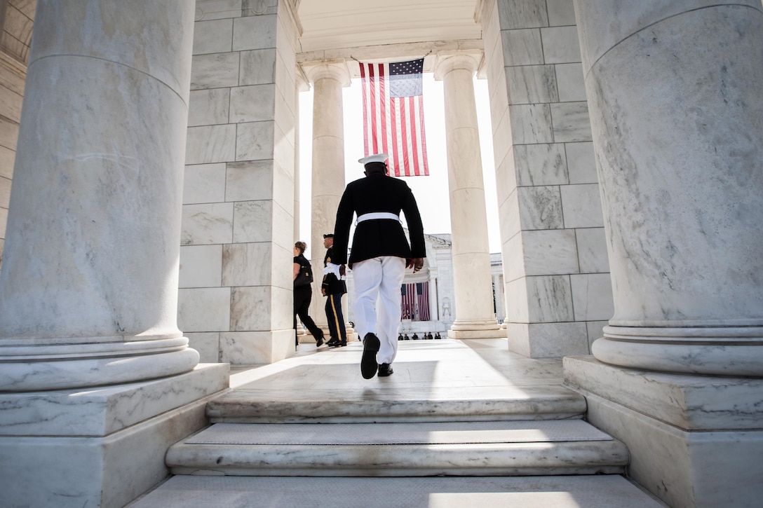Sgt. Maj. Ronald L. Green, the 18th Sergeant Major of the Marine Corps, participates in a wreath laying ceremony at the Tomb of the Unknown Soldier in honor of National Armed Forces Day at Arlington National Cemetery in Arlington, Va., May 16, 2015. 