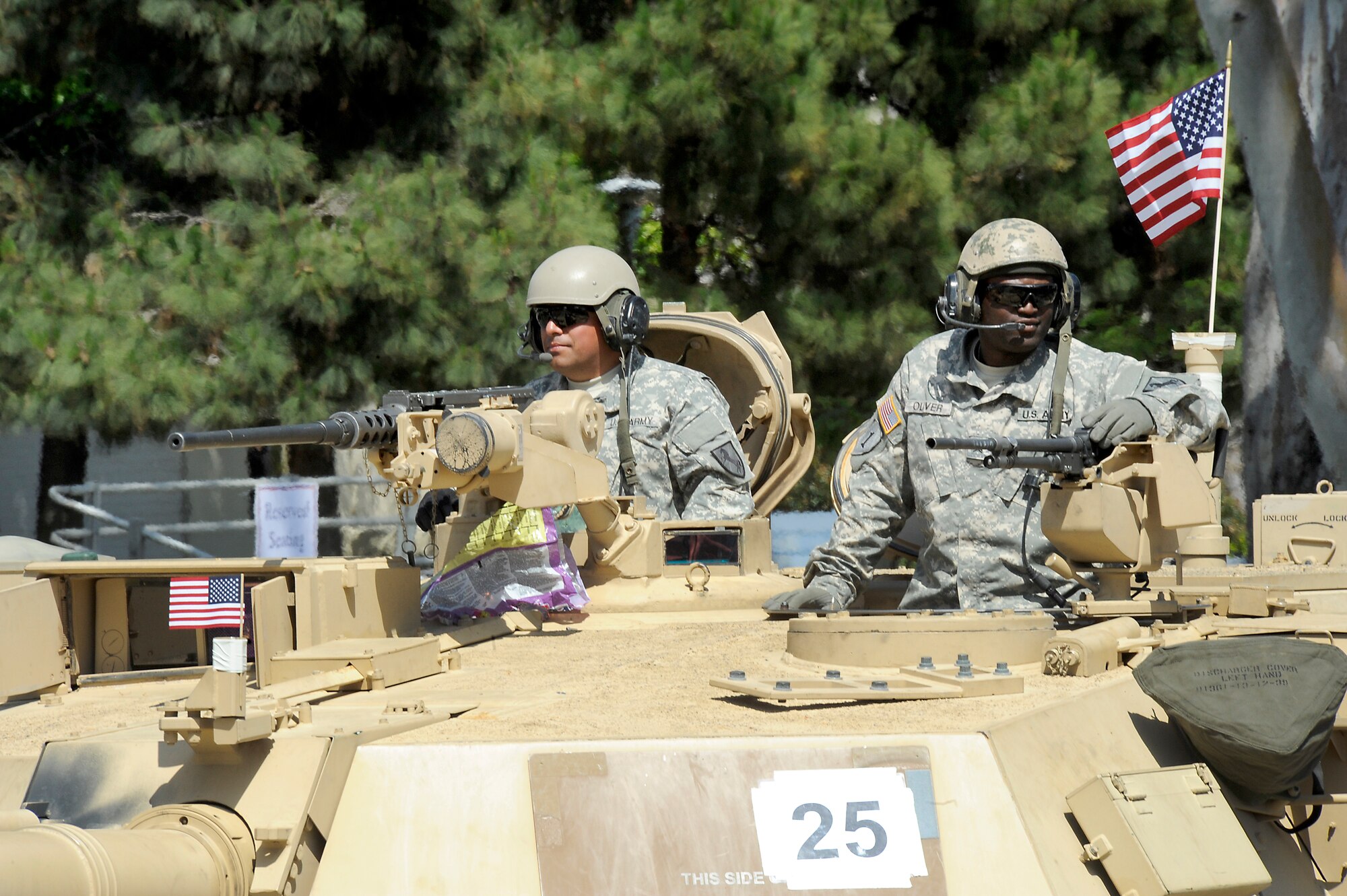 Soldiers from the 11th Cavalry Regiment, Fort Irwin, Calif., drive an M1A1 Abrams tank down Torrance Blvd. during the annual Torrance Armed Forces Day parade, May 16. (Photo by Joe Juarez) 