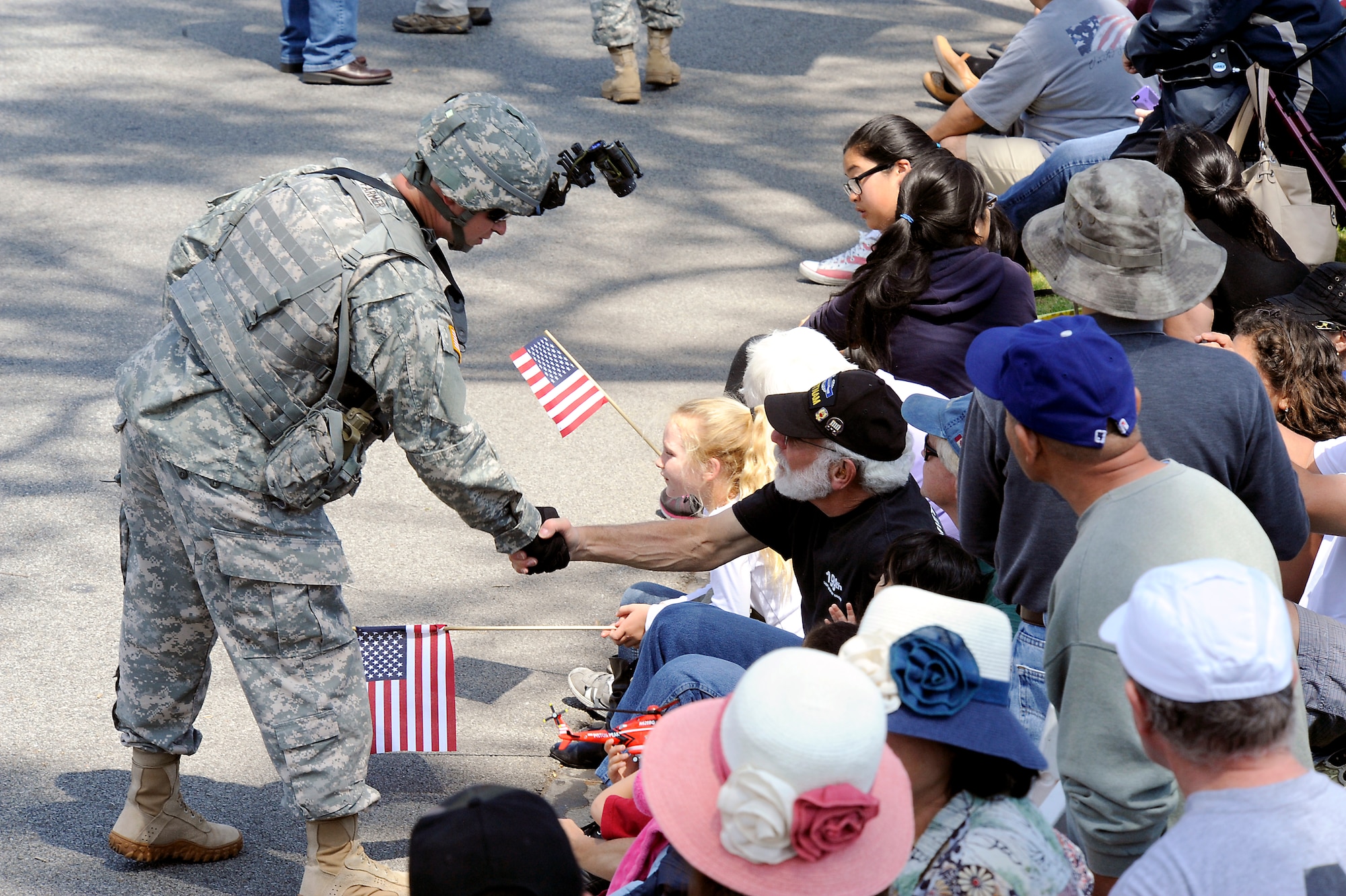 A soldier greets the crowds during the annual Torrance Armed Forces Day parade, May 16. (Photo by Joe Juarez) 