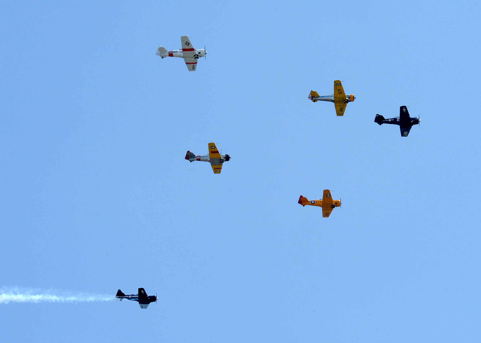 Vintage military aircraft buzz the parade route during the annual Torrance Armed Forces Day parade, May 16. (Photo by Joe Juarez) 
