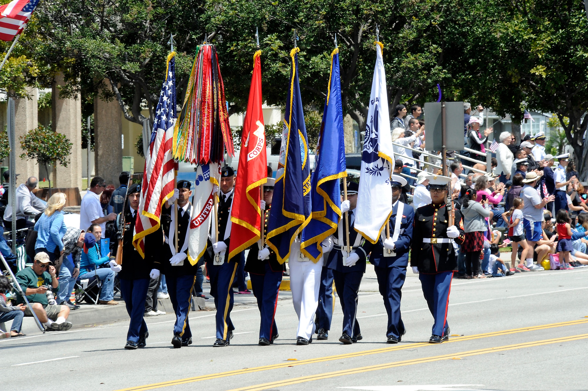 A joint services color guard leads off the annual Torrance Armed Forces Day parade, May 16. (Photo by Joe Juarez) 