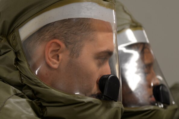 A member of the 51st Medical Group watches a simulated victim being cleaned May 14, 2015, at Osan Air Base, Republic of Korea. This scenario was part of the readiness exercise Beverly Midnight 15-02. Beverly Midnight tests Osan’s wartime procedures, and realistically looks at our ability to defend the base, execute operations and receive follow-on forces. (U.S. Air Force photo by Staff Sgt. Benjamin Sutton/Released) 