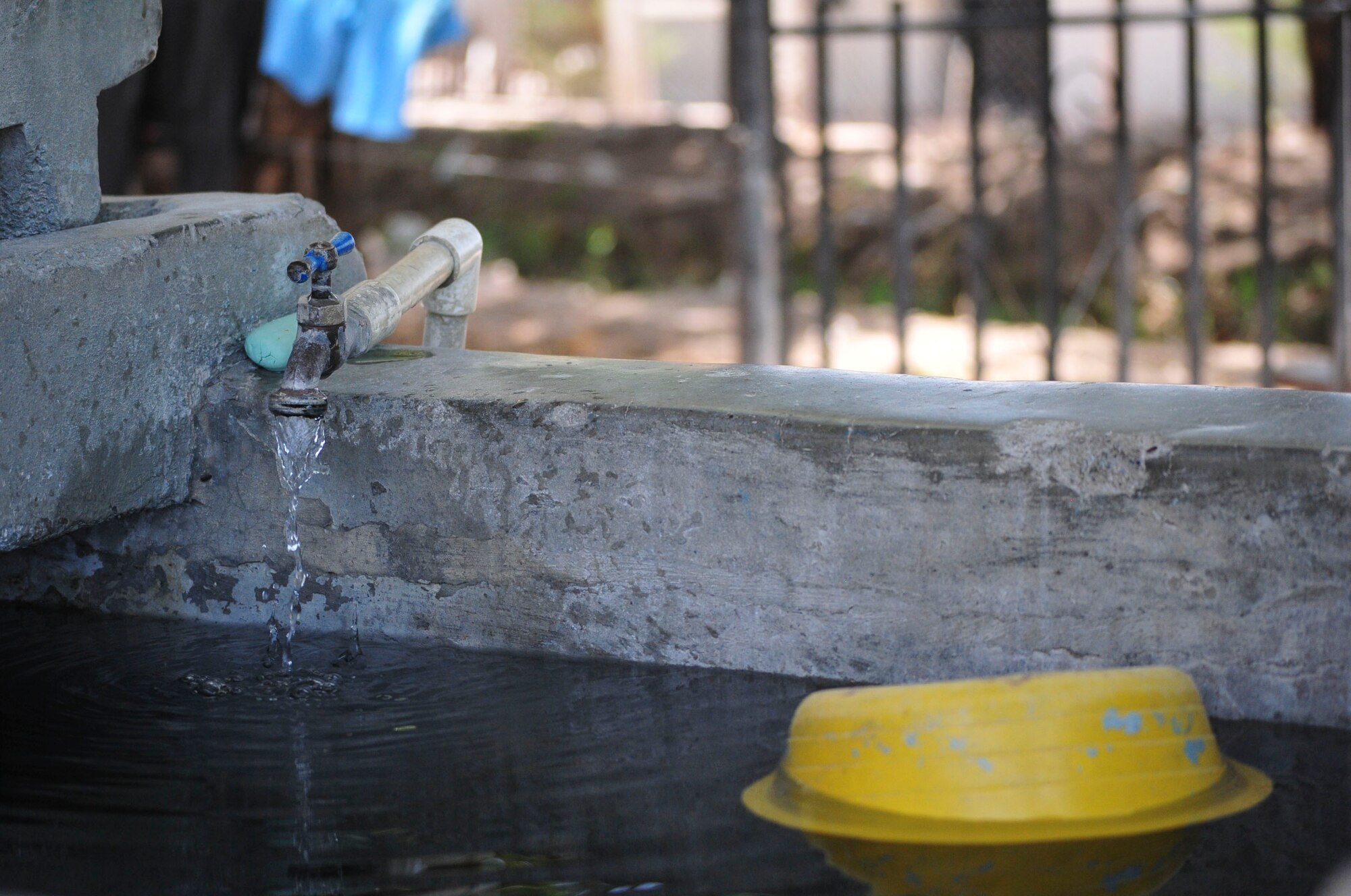Water drips from a spigot at a wash station at the Saint Anthony of Padua Boys Home outside La Paz, Honduras May 16, 2015. The 1st Battalion, 228th Aviation Regiment from Soto Cano Air Base leads monthly visits to local orphanages around Soto Cano Air Base, to serve the community. (U.S. Air Force photo by Capt. Christopher Love)