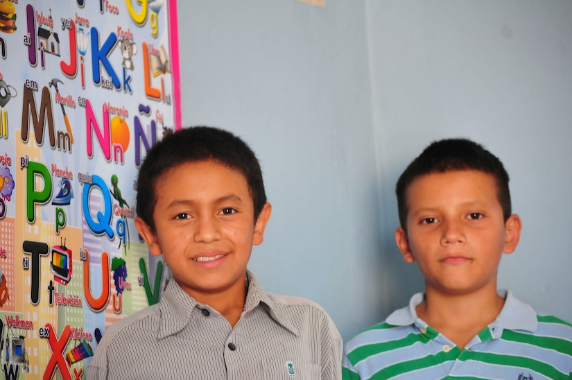 Two boys pose for a picture at the Saint Anthony of Padua Boys Home outside La Paz, Honduras May 16, 2015. The 1st Battalion, 228th Aviation Regiment from Soto Cano Air Base leads monthly visits to local orphanages around Soto Cano Air Base, to serve the community. (U.S. Air Force photo by Capt. Christopher Love)