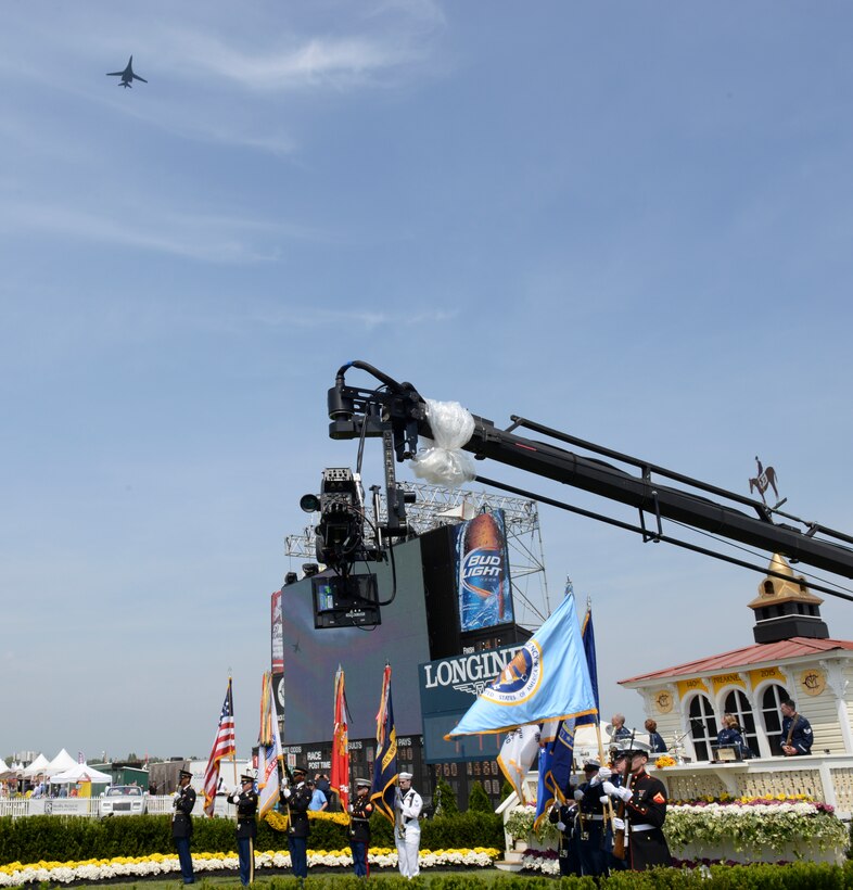 Full Spectrum, the newest ensemble of the Heritage of America Band, perform “America the Beautiful” at the Preakness Stakes May 16, 2015 during a flyover of the B-1 Lancer in Baltimore, Md. The event, which was nationally televised, broke records in attendance by hosting more than 170,000 people.
