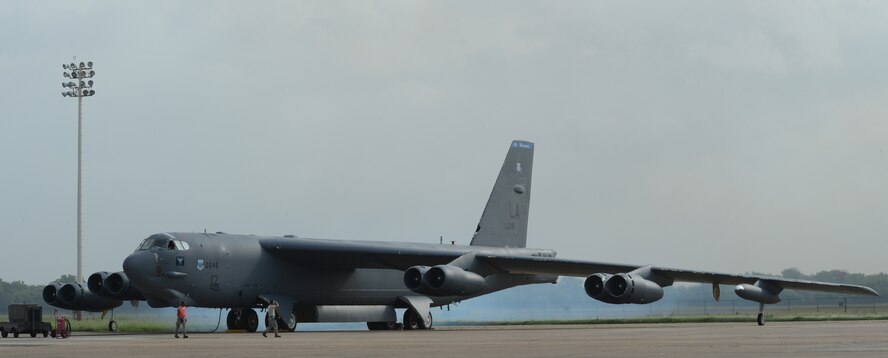 The engines on a B-52H Stratofortress are started in preparation for an aircraft launch in support of Exercise Eager Lion 2015 mission at Barksdale Air Force Base, La., May 17, 2015. One of U.S. Central Command's premier exercises, two B-52s from the 2nd Bomb Wing took off on a 35-hour, 14,000-mile nonstop mission from Barksdale May 17 to support the event. Exercise Eager Lion consists of a series of simulated scenarios to facilitate a coordinated, partnered military response to both conventional and unconventional threats. While U.S. participation in Exercise Eager Lion occurs on a regular basis, this year marks the first time the B-52 is integrated into the exercise. (U.S. Air Force photo/Senior Airman Benjamin Gonsier)