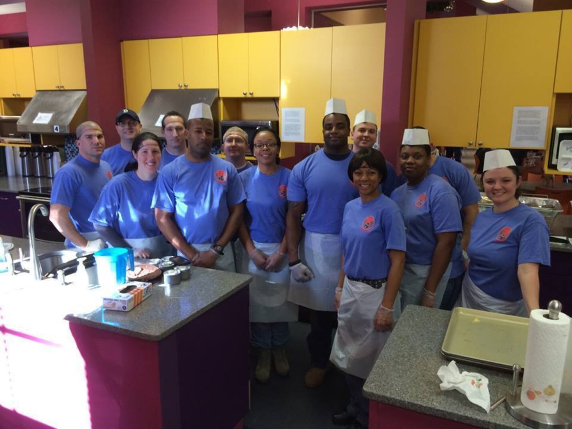 Approximately 15 members of the Tennessee Air National Guard's 164th Airlift Wing Mission Support Group, out of Memphis, Tenn., volunteered their time at St. Jude's Ronald McDonald House, serving breakfast to more than 80 families and patients on Dec. 21, 2014. (Left to right) Staff Sgt. Troy Pollock, Staff Sgt. Tim Andrassy, Tech Sgt. Elizabeth von Allmen, SSgt. Robert Morgan, TSgt. Al Wilson, TSgt. Nathaniel von Allmen, SSgt. Vanessa Nickles, Senior Airmen Terrance Jones, Airman 1st Class John Oliver, Master Sgt. Vanilla Nixon, Tech Sgt. Sherveta Campbell, Staff Sgt. Shane Howell, and Tech Sgt. Melissa Scott. (US Air National Guard photo provided by the 164th Airlift Wing/RELEASED)