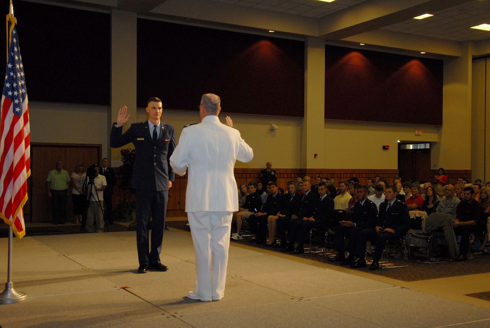 U.S. Air Force 2nd Lt. Robert G. Crumley, Air Force ROTC Detachment 847 graduate, swears in during the Air Force ROTC Det. 847 Commissioning Ceremony at Angelo State University’s C. J. Davidson Conference Center in San Angelo, Texas, May 15, 2015. Crumley will start his career as a space and missiles operation officer. (U.S. Air Force photo by Senior Airman Joshua Edwards/ Released)
