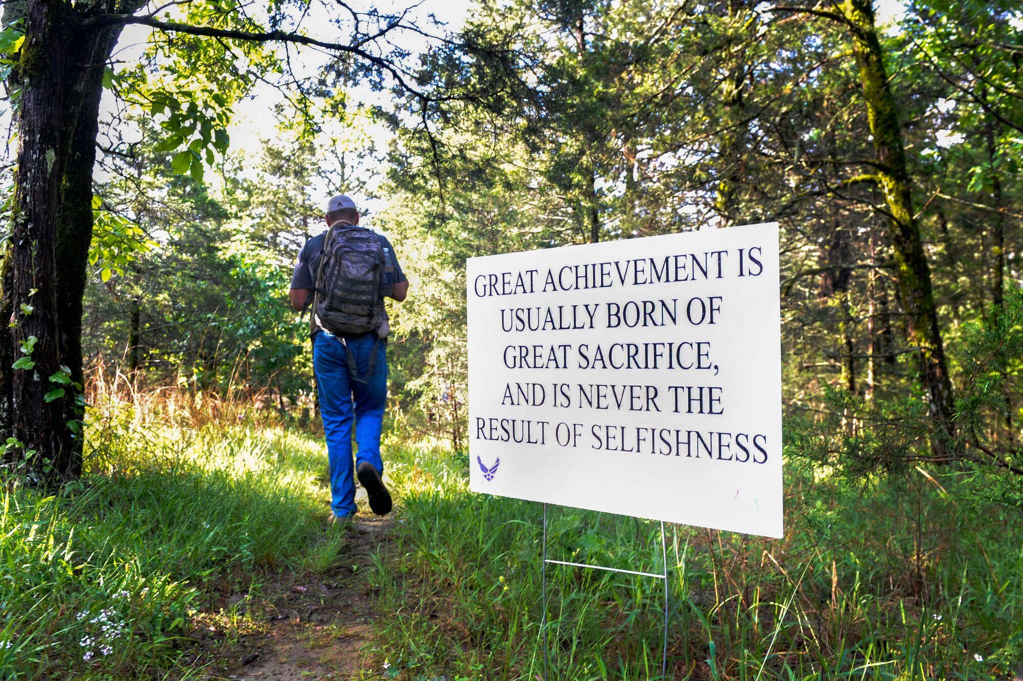Maj. Trent Simshauser, a pilot with the 184th Attack Squadron Ebbing Air National Guard Base, hikes his way to the top of Mount Magazine May 8, 2015, at Mount Magazine State Park, Ark. Mount Magazine sits in the center of the Ozark National Forest in the Arkansas River Valley. (U.S. Air Force photo by Senior Airman Stephanie Serrano)