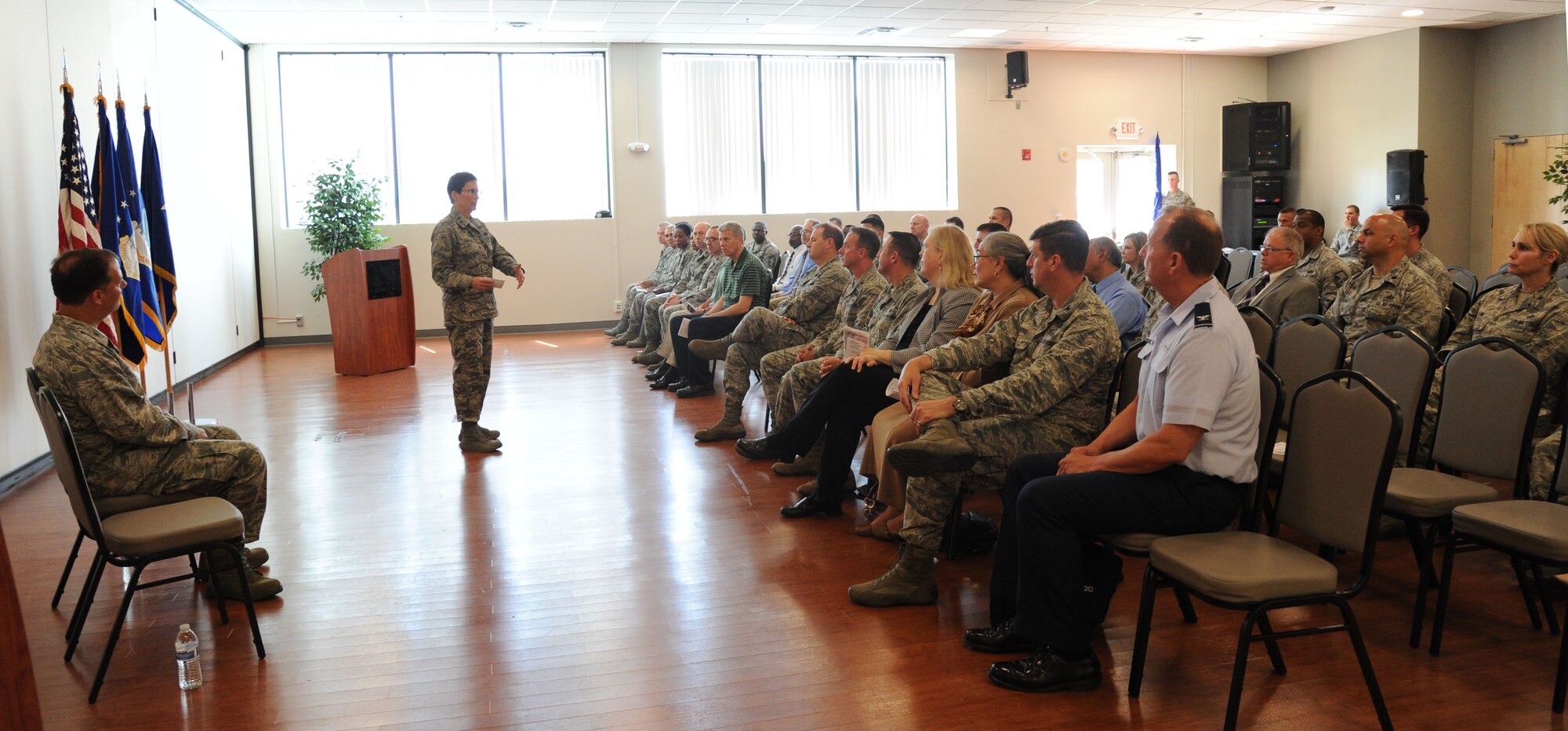 Maj. Gen. Theresa Carter addresses the audience during a ceremony activating the Air Force Installation and Mission Support Center’s Detachment 5 at Joint Base Andrews, Maryland, May 18, 2015. Col. Michael Smith will serve as the interim commander of Detachment 5. The AFDW AFIMSC detachment will initially include 13 members. Their primary priority over the next few months will be establishing sustainable operating procedures and building relationships. Carter is the AFIMSC commander. (U.S. Air Force photo/Master Sgt. Tammie Moore)