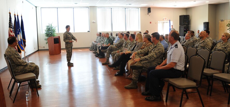 Maj. Gen. Theresa Carter, AFIMSC commander, addresses the audience during a ceremony activating the Air Force Installation and Mission Support Center’s Detachment 5 at Joint Base Andrews, Maryland, May 18, 2015. Col. Michael Smith will serve as the interim commander of Detachment 5. The AFDW AFIMSC detachment will initially include 13 members. Their primary priority over the next few months will be establishing sustainable operating procedures and building relationships. (U.S. Air Force photo/Master Sgt. Tammie Moore) 