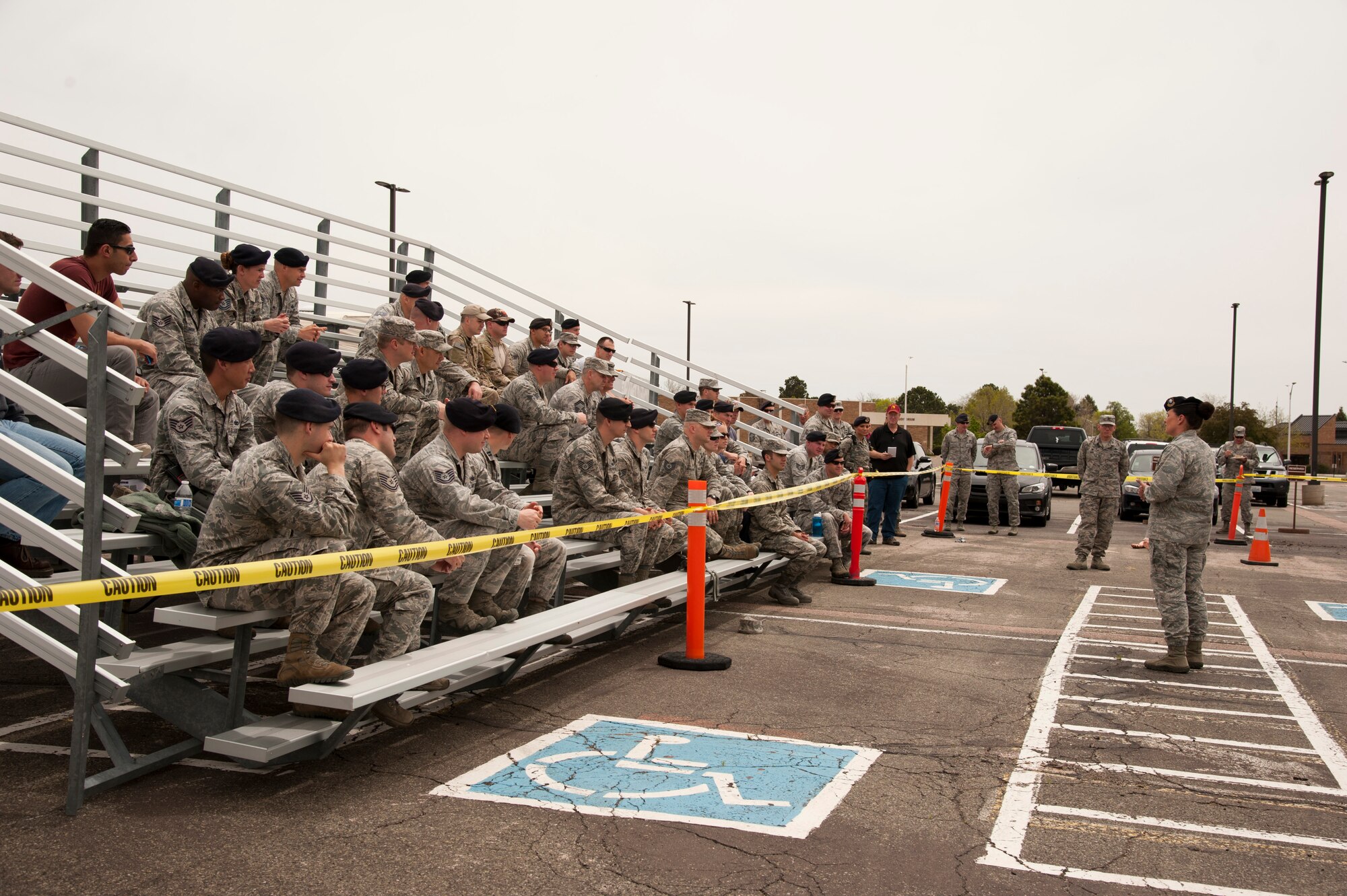 PETERSON AIR FORCE BASE, Colo. – The 21st Security Forces Squadron hosted a shoot house challenge for area armed forces members and local law enforcement in recognition of Police Week, May 14, 2015. The shoot house challenge consisted of several obstacles including tire flipping, physical training, door breaching, target shooting with weapons equipped with lasers, close quarters combat and a dummy drag. Other activities included a K9 military working dog demonstration. (U.S. Air Force photo by Senior Airman Tiffany DeNault)