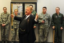 President Teddy Roosevelt, portrayed by Joe Wiegand, performs at the 91st Missile Wing headquarters building on Minot Air Force Base, N.D., May 7, 2015. During his visit, Teddy also toured Uniform-01 and stopped at 91st Missile Wing headquarters to visit with Airmen and learn about their mission. (U.S. Air Force photo/Senior Airman Kristoffer Kaubisch)