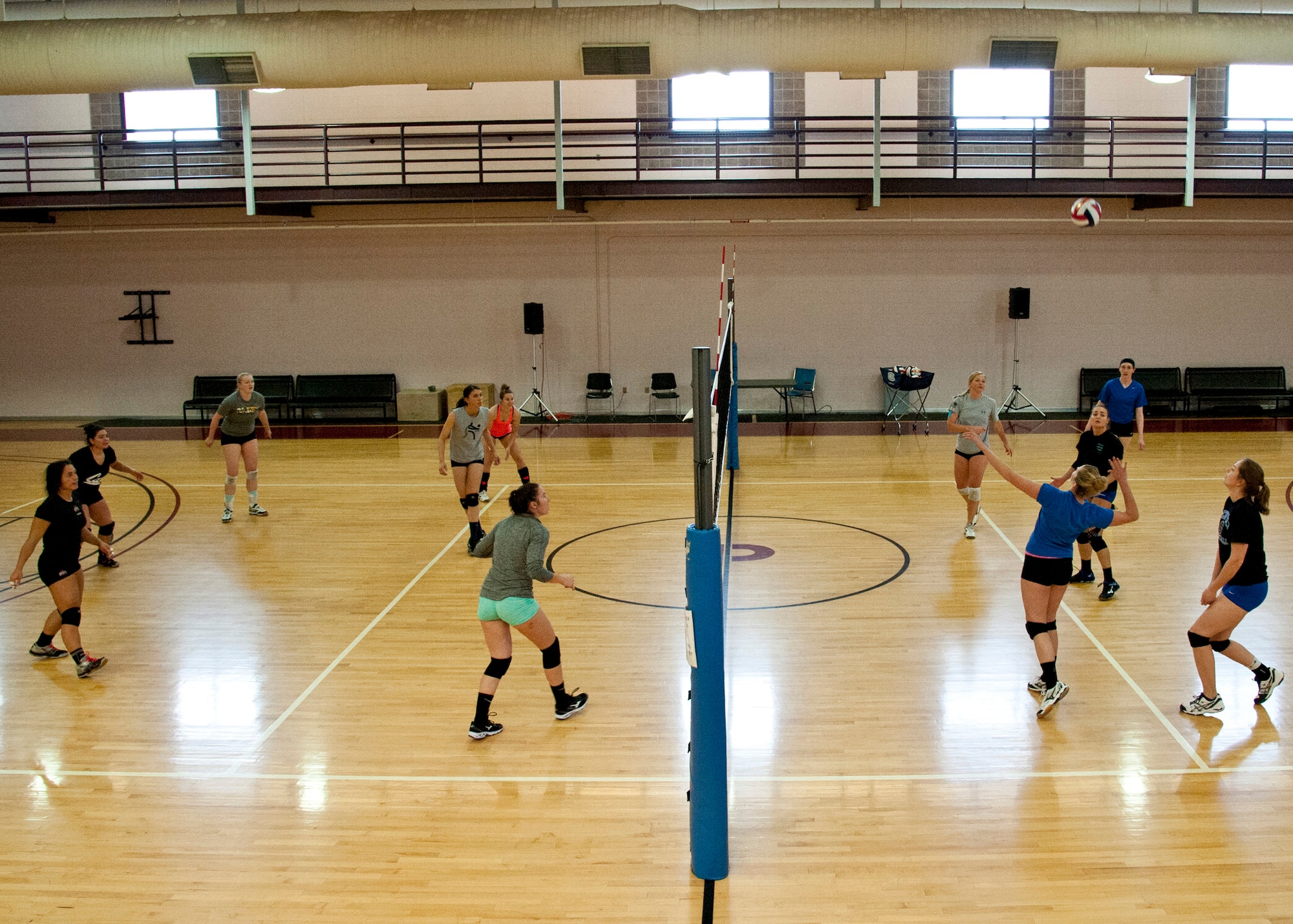 PETERSON AIR FORCE BASE, Colo. – Members of the Air Force female volleyball team practice for the Armed Forces Volleyball Tournament at the Peterson Fitness Center, May 12, 2015. The team held their try-outs and practices at the fitness center from May 4-21 before the Armed Forces Volleyball Tournament in Detroit, Michigan. (U.S. Air Force photo by Senior Airman Tiffany DeNault)