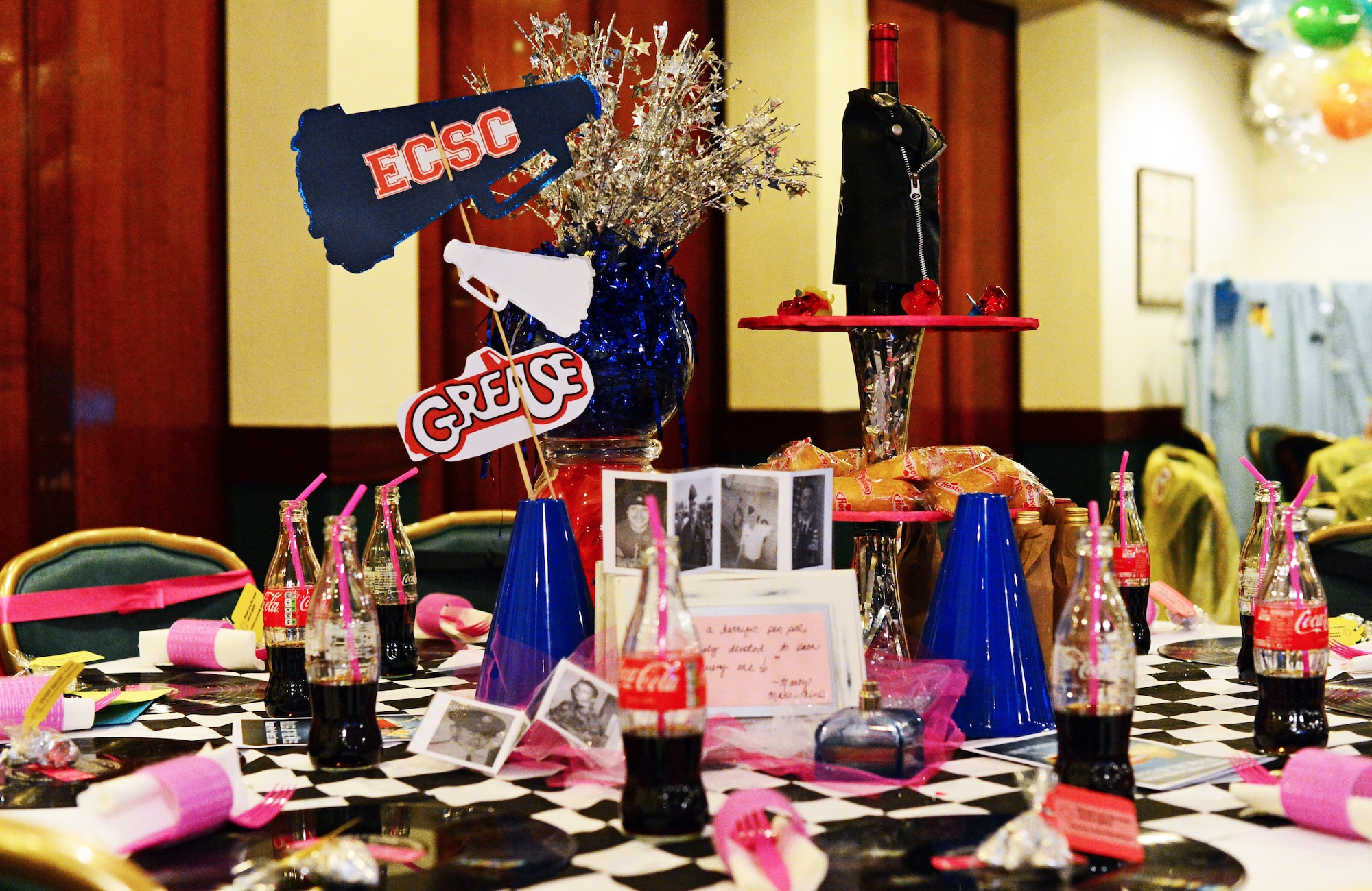 Movie-inspired table decorations provided the back-drop for the Liberty Spouses Dining-In at Royal Air Force Lakenheath, England, May 8, 2015. More than 160 Liberty Wing spouses participated in the movie-themed event which consisited of Liberty Oscar competitions in spirit, table decorating, costumes and skits. (U.S. Air Force photo by Senior Airman Erin O’Shea/Released)