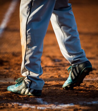 A player walks to the batter’s box during a softball game, May 13, 2015 at Joint Base Charleston – Air Base, S.C. Joint Base Charleston’s 2015 Intramural Softball Season is expected to run till mid-June. (U.S. Air Force photo/Airman 1st Class Clayton Cupit)