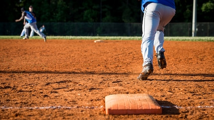 Base runners advance during a softball game, May 13, 2015 at Joint Base Charleston – Air Base, S.C. Joint Base Charleston’s 2015 Intramural Softball Season is expected to run till mid-June. (U.S. Air Force photo/Airman 1st Class Clayton Cupit)