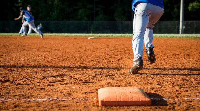 Base runners advance during a softball game, May 13, 2015 at Joint Base Charleston – Air Base, S.C. Joint Base Charleston’s 2015 Intramural Softball Season is expected to run till mid-June. (U.S. Air Force photo/Airman 1st Class Clayton Cupit)