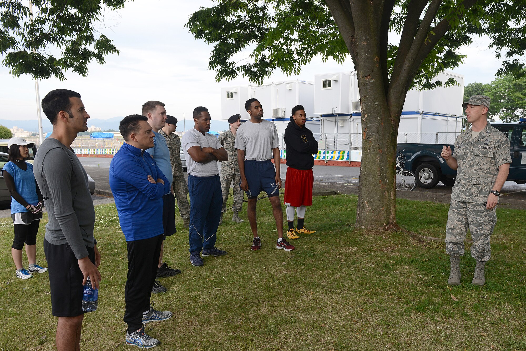 Col. Scott Maskery, 374th Mission Support Group commander, addresses Police Week 5K run participants at Yokota Air Base, Japan, May 12, 2015. During his speech, Maskery thanked the members of the 374th Security Forces Squadron for defending Yokota and the sacrifices they have made for their country. (U.S. Air Force photo by Airman 1st Class David C. Danford/Released)