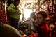 Military dependents wait for takeoff inside an Alaska Air National Guard C-130 Hercules at Osan Air Base, Korea, May 15, 2015. The dependents participated in a noncombatant evacuation exercise from Osan to Yokota Air Base, Japan. (Airman 1st Class Elizabeth Baker/Released)