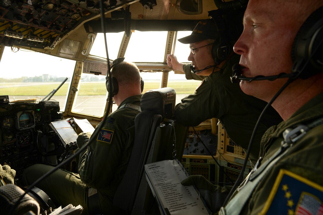 The crew of a C-130 Hercules assigned to Joint Base Elmendorf-Richardson taxis before takeoff at Yokota Air Base, Japan, May 15, 2015. JBER supported the 36th Airlift Squadron with a C-130 which performed airlift operations during a noncombatant evacuation exercise, in order to test Yokota’s ability to integrate with partner units. (Airman 1st Class Elizabeth Baker/Released)