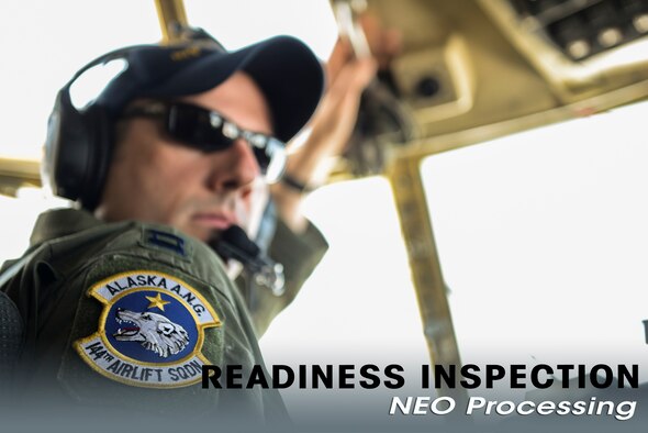 Capt. Jason Guinnee, pilot with the 144th Airlift Squadron, Alaska Air National Guard, flies a C-130 Hercules from Yokota Air Base, Japan, to Osan Air Base, Korea, May 15, 2015. The Alaska C-130 picked up dependents of Osan military members to perform a mock evacuation to Yokota as part of a simulated noncombatant evacuation exercise. (Airman 1st Class Elizabeth Baker/Released)