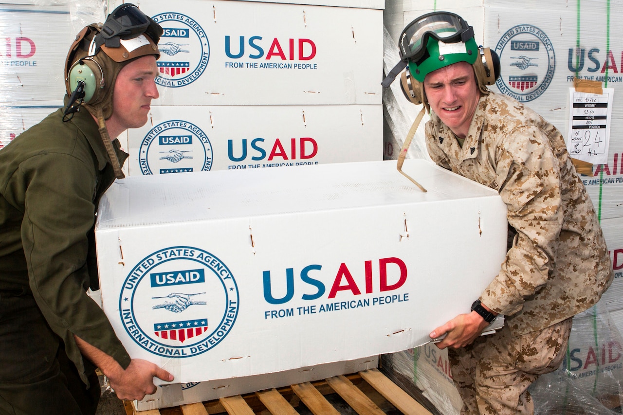 U.S. service members assigned to Joint Task Force 505 load aid and relief supplies onto an MV-22 Osprey at Tribhuvan International Airport in Kathmandu, Nepal, May 17, 2015. The supplies were provided for earthquake victims in remote areas of Nepal. U.S. Marine Corps photo by Staff Sgt. Jeffrey D. Anderson