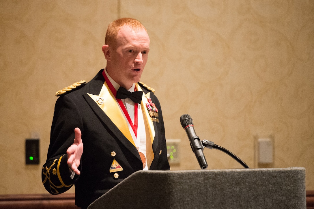 Army Maj. Chris Dempsey introduces his father, Army Gen. Martin E. Dempsey, chairman of the Joint Chiefs of Staff, at the 2nd Armored Brigade Combat Team Ball in Junction City, Kan., May 15, 2015. The chairman was the keynote speaker at the event.