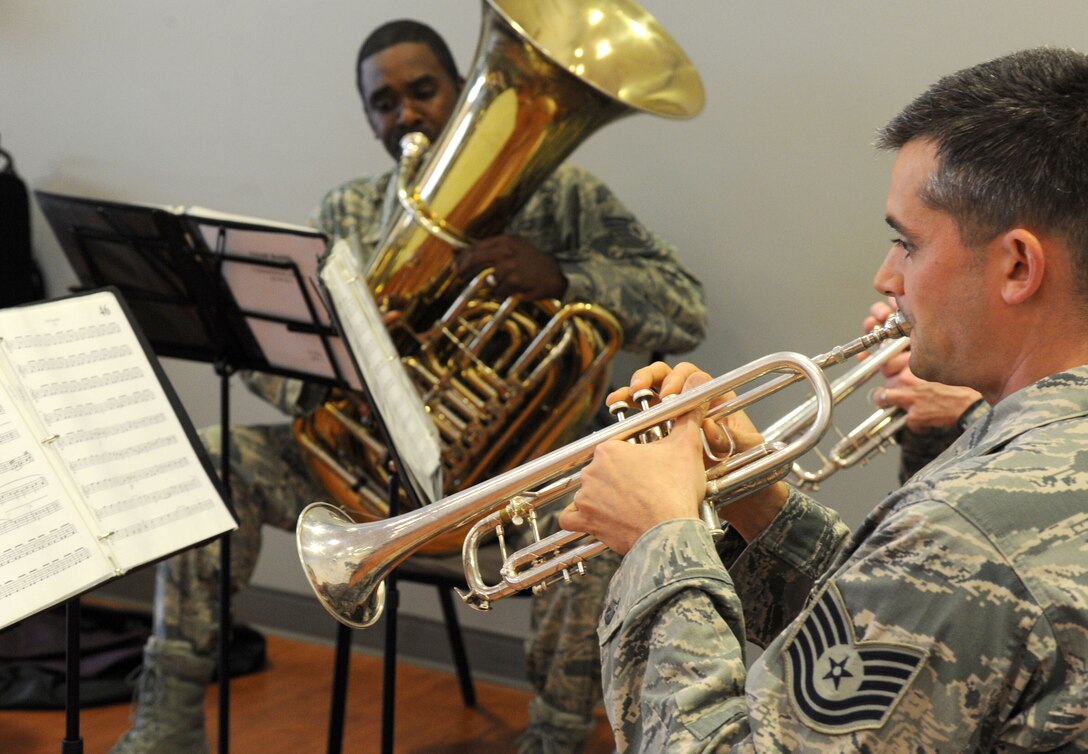Members of the Air Force Band’s ensemble Ceremonial Brass plays during a ceremony activating the Air Force Installation and Mission Support Center’s Detachment 5 at Joint Base Andrews, Maryland, May 18, 2015. AFIMSC will serve as a central management organization that will facilitate the equal allocation of resources and the standardization of services consistent with Air Force priorities across all installations. (U.S. Air Force photo/Master Sgt. Tammie Moore)