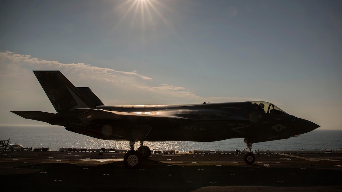 An F-35B Lightning II Joint Strike Fighter idles on the flight deck of the USS Wasp (LHD-1) in preparation for take-off, May 18, 2015. The short take-off, vertical landing capabilities of the F-35B are crucial to the mission of the Marine Corps and necessary for operation aboard a Navy amphibious ship. The aircraft are stationed with Marine Fighter Attack Training Squadron 501, Marine Aircraft Group 31, 2nd Marine Aircraft Wing, Beaufort, South Carolina and Marine Fighter Attack Squadron 121, Marine Aircraft Group 13, 3rd Marine Aircraft Wing, Yuma, Arizona. (U.S. Marine Corps photo by Lance Cpl. Remington Hall/Released)